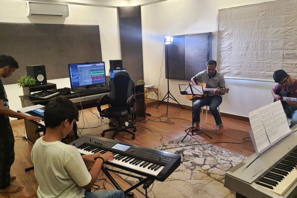 Students in a group music class at Motif Academy of Music, HSR Layout, Bangalore